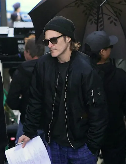 Model wearing arthur fleck joker folie À deux black satin jacket