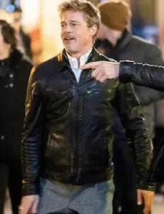 Model wearing brad pitt wolfs 2024 leather jacket