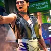 Model wearing call of duty rhea ripley black leather vest