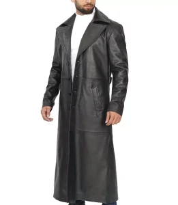 Men's full length black leather duster coat side view