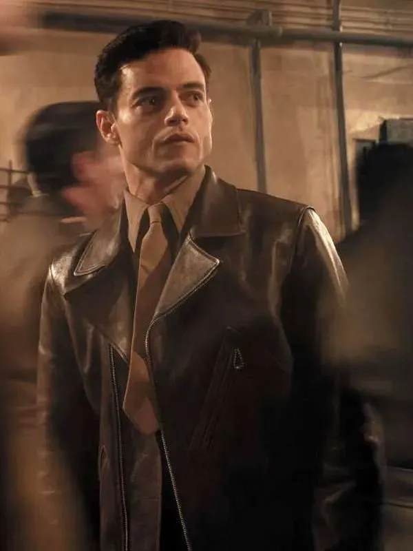 The amateur 2025 rami malek brown leather jacket front view