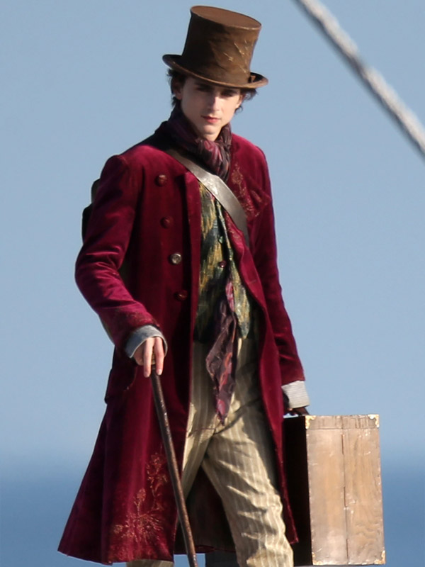 Model wearing timothée chalamet wonka maroon velvet coat